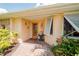 Welcoming home exterior with brick walkway and lush landscaping at 145 Bunker Rd, Rotonda West, FL 33947