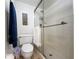 Clean bathroom with shower, toilet and a single vanity at 1551 Beach Rd # 205, Englewood, FL 34223