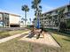 Community picnic area with grill and seating at 1551 Beach Rd # 205, Englewood, FL 34223