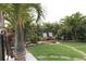 Relaxing backyard patio with seating and tropical landscaping at 170 Antilla Dr, Rotonda West, FL 33947