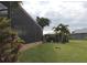 Spacious backyard with screened enclosure and gazebo at 170 Antilla Dr, Rotonda West, FL 33947