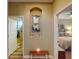 Hallway with built-in niche, mirror, and bench at 170 Antilla Dr, Rotonda West, FL 33947