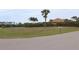 Empty lot with some vegetation and a mailbox at 170 Antilla Dr, Rotonda West, FL 33947