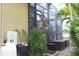 Outdoor screen enclosure with storage, ideal for relaxing at 170 Antilla Dr, Rotonda West, FL 33947