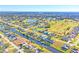 Aerial view of a canal-front home, near golf course at 197 Bunker Rd, Rotonda West, FL 33947