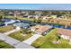 Aerial view of a canal front home with surrounding neighborhood at 197 Bunker Rd, Rotonda West, FL 33947