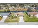 Aerial view of a home and canal; quiet neighborhood setting at 197 Bunker Rd, Rotonda West, FL 33947