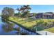 Backyard oasis with canal views and a dock at 197 Bunker Rd, Rotonda West, FL 33947
