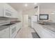 Efficient kitchen with white appliances and ample counter space at 197 Bunker Rd, Rotonda West, FL 33947