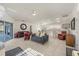 Open living room and kitchen with comfortable seating at 197 Bunker Rd, Rotonda West, FL 33947