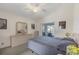 Spacious main bedroom with a king-size bed and backyard access at 197 Bunker Rd, Rotonda West, FL 33947