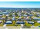 Aerial view showcasing a home's neighborhood and surrounding area at 221 E Wentworth St, Englewood, FL 34223