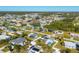 Wide aerial view of the neighborhood, showing surrounding houses and landscape at 221 E Wentworth St, Englewood, FL 34223