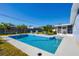 Inviting pool area with plenty of space for lounging at 221 E Wentworth St, Englewood, FL 34223