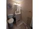 Updated bathroom with light vanity and tile floor at 244 Saint Augustine Ave # 102, Venice, FL 34285