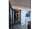 Open door revealing condo interior with tiled floors at 244 Saint Augustine Ave # 102, Venice, FL 34285