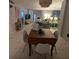 Open concept dining area with seating for four at 244 Saint Augustine Ave # 102, Venice, FL 34285