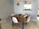 Dining area featuring a drop-leaf table at 244 Saint Augustine Ave # 102, Venice, FL 34285