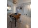 Small dining area with a table and four chairs at 244 Saint Augustine Ave # 102, Venice, FL 34285