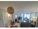 Bright living room with comfy seating and access to a balcony at 244 Saint Augustine Ave # 102, Venice, FL 34285