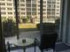 Comfortable patio furniture overlooking the pool at 244 Saint Augustine Ave # 102, Venice, FL 34285