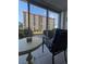 View from condo overlooking a building and lawn at 244 Saint Augustine Ave # 102, Venice, FL 34285