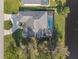 Aerial view of home, pool, and canal at 249 Sportsman Rd, Rotonda West, FL 33947