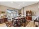 Bright dining area with a large table and built-in hutch at 249 Sportsman Rd, Rotonda West, FL 33947