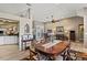 Formal dining room with a large wooden table and hardwood floors at 249 Sportsman Rd, Rotonda West, FL 33947