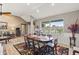 Dining room featuring a large table, hardwood floors, and window view at 249 Sportsman Rd, Rotonda West, FL 33947