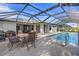 Enjoy this spacious pool and patio area, complete with a screened enclosure at 249 Sportsman Rd, Rotonda West, FL 33947