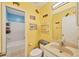 Guest bathroom with a single sink vanity and shower/tub combo at 255 Boundary Blvd # 104, Rotonda West, FL 33947