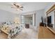Main bedroom with a tropical print comforter and a dresser at 255 Boundary Blvd # 104, Rotonda West, FL 33947