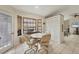 Kitchen with breakfast nook and built-in cabinets at 255 Boundary Blvd # 104, Rotonda West, FL 33947