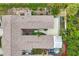 Overhead view showcasing home's unique layout and backyard at 255 Boundary Blvd # 105, Rotonda West, FL 33947