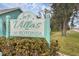 Community entrance sign for Villas of Rotonda at 255 Boundary Blvd # 105, Rotonda West, FL 33947
