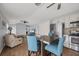 Open concept kitchen with island and views into living room at 255 Boundary Blvd # 105, Rotonda West, FL 33947