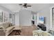 Bright living room with vaulted ceiling, light walls, and comfy seating at 255 Boundary Blvd # 105, Rotonda West, FL 33947