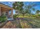 Spacious backyard with lush lawn, large trees, and privacy at 2888 Myakka Creek Ct., Port Charlotte, FL 33953