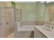 Bathroom with shower, tub and vanity at 2888 Myakka Creek Ct., Port Charlotte, FL 33953