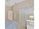 Bedroom with large closet and view of another room at 2888 Myakka Creek Ct., Port Charlotte, FL 33953