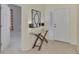 Bright entryway with glass-top console table and mirror at 2888 Myakka Creek Ct., Port Charlotte, FL 33953