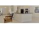 Kitchen with black appliances and granite countertops at 2888 Myakka Creek Ct., Port Charlotte, FL 33953
