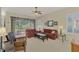 Living room with sectional sofa, coffee table, and access to patio at 2888 Myakka Creek Ct., Port Charlotte, FL 33953