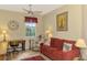 Home office with hardwood floors and comfy couch at 3283 Osprey Ln, Port Charlotte, FL 33953