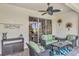 Covered patio with wicker furniture and ceiling fan at 3283 Osprey Ln, Port Charlotte, FL 33953