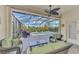 Spacious covered patio overlooking the pool and spa at 3283 Osprey Ln, Port Charlotte, FL 33953