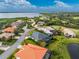 Single-Gathering home with a dark gray roof and screened enclosure at 3310 Bay Ridge Way, Port Charlotte, FL 33953
