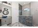 Updated bathroom with a walk-in shower and custom vanity at 3310 Bay Ridge Way, Port Charlotte, FL 33953