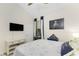 Guest bedroom with a comfortable bed and TV at 3310 Bay Ridge Way, Port Charlotte, FL 33953